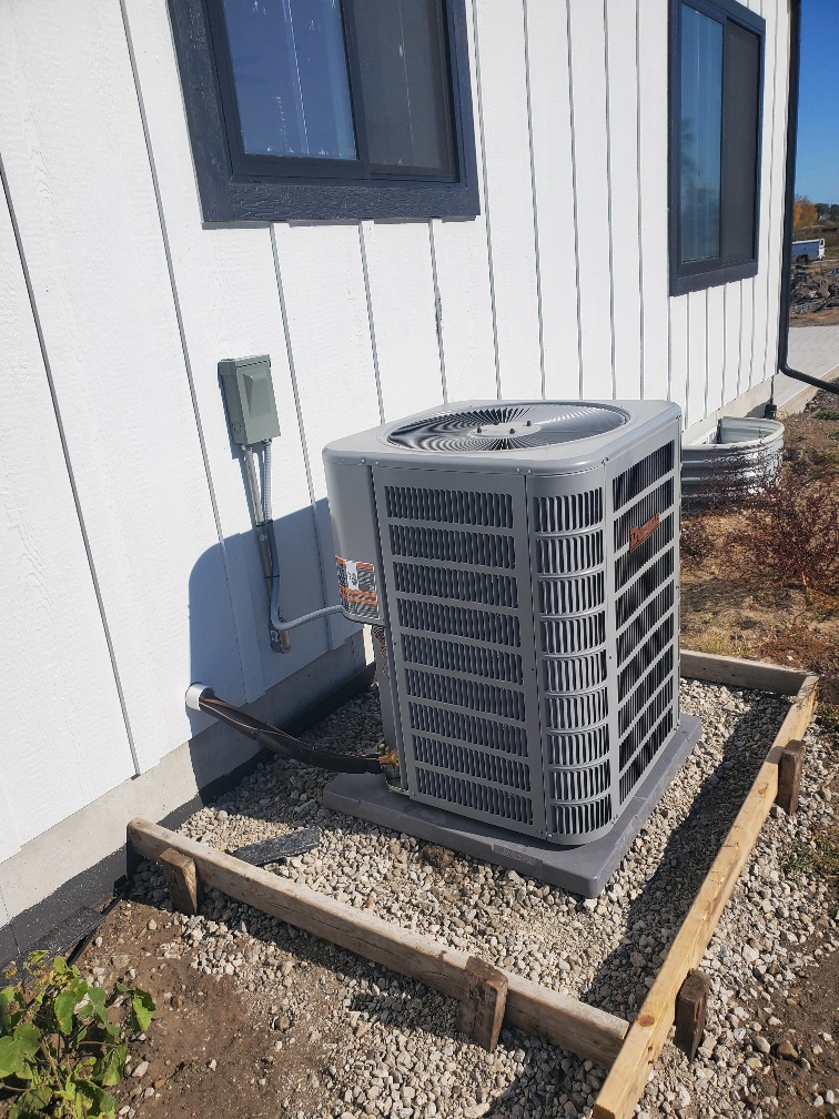 Completed Ducane air-conditioning condenser installation