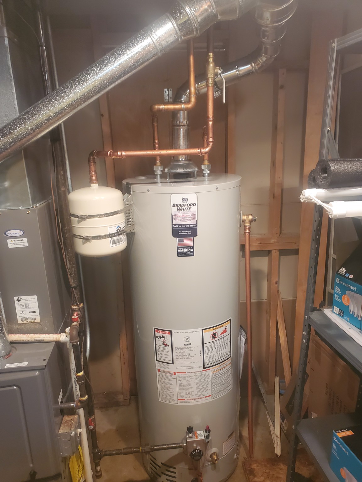 Completed Bradford White standard tank water heater installation